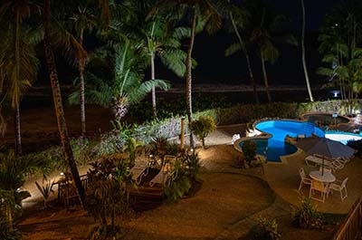 Night view of the pool and garden